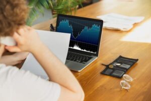 What is an outstanding check and why is it included in preparing a bank reconciliation?